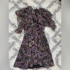 Flora print dress from the brand “BCBG “